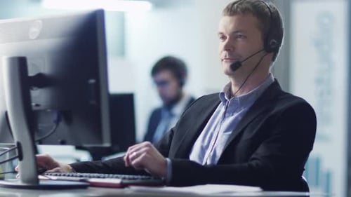 Customer Service Operator at Work in Call Center