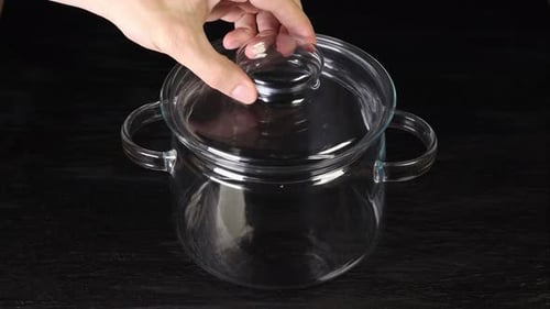 Cook Removes The Lid