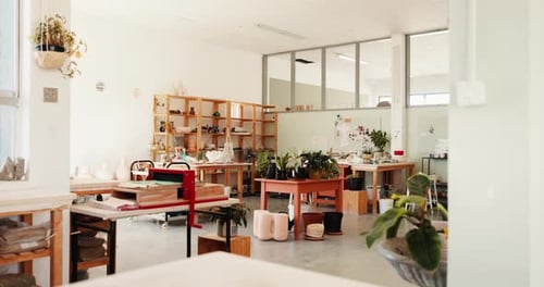 Pottery, ceramic and interior of empty workshop with clay objects, design and collection on table