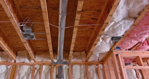 Home Under Construction with Insulation