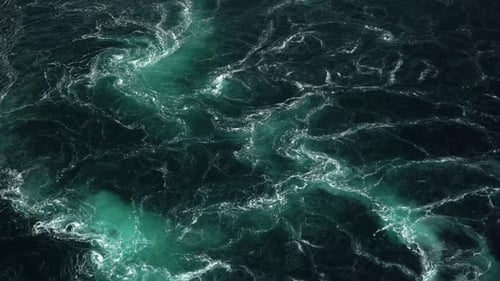 Powerful tidal currents at the famous Saltstaumen in Norway. Hundreds of whirlpools forming in the t