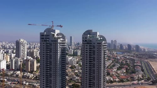 Ashdod city skyline and sea aerial view at noon