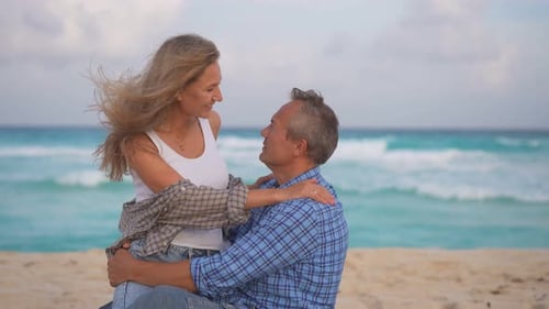 Romantic Middleaged Couple Enjoying a Peaceful Evening Together on the Beach Love Connection and