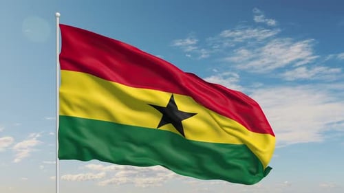 Ghana Flag Waving Proudly Against a Clear Blue Sky
