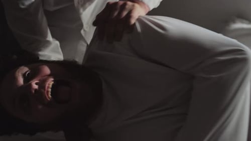 Distressed Man Yelling in Hospital Bed Close Up