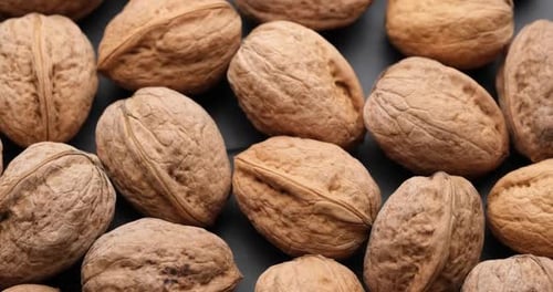 Close Up of Walnuts on Gray Surface