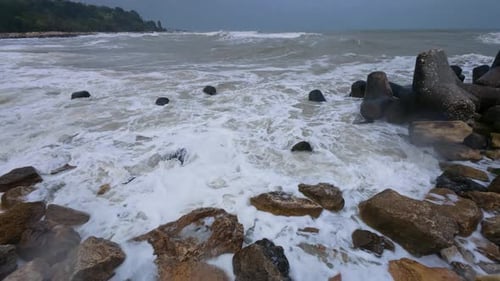 Huge Storm Waves Crashing Against Rocks on the Coast Dramatic View of Raging Sea and Extreme Weather