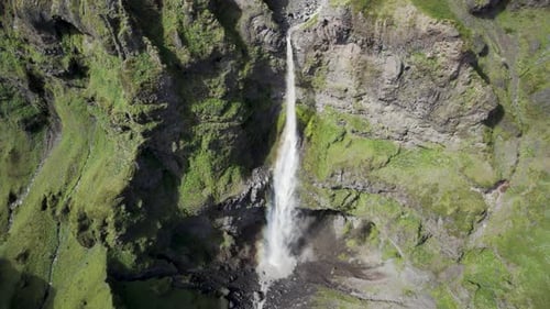 Aerial view of a stream of water in Mulagljufur Canyon, Iceland.