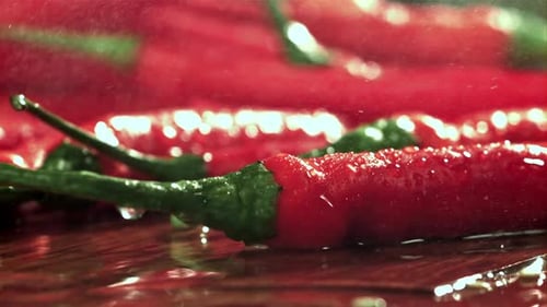 Drops of Water Fall on Chili Peppers Filmed on a Highspeed Camera at 1000 Fps