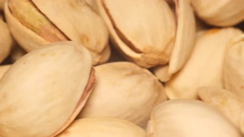 Closeup of a Pistachio in the Shell Spinning in a Circle