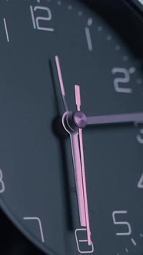 A CloseUp View of an Elegant Black Watch Highlighting Its Unique Design and Details