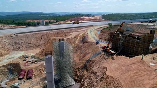 Aerial View of Bridge Pier Construction in Highway Infrastructure Project