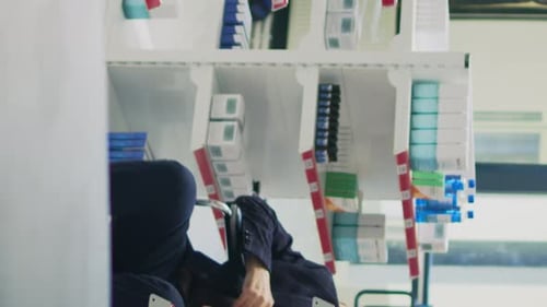 Adults Talking in a Pharmacy