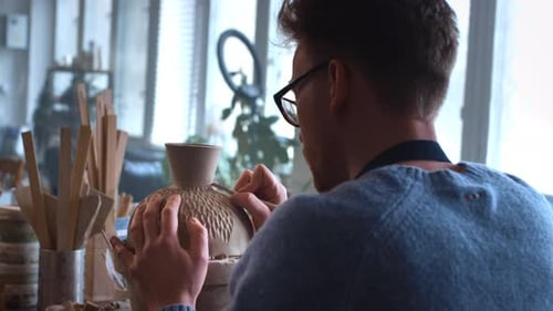 Young Woman in Pottery Studio Using Pottery Wheel Handmade Ceramics Creative