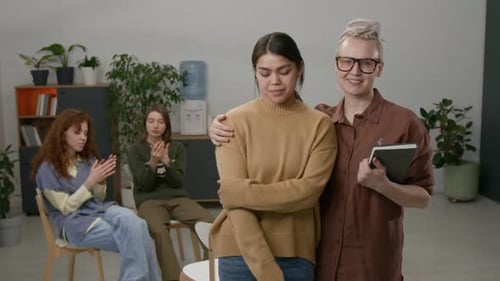 Group Supporting Young Woman