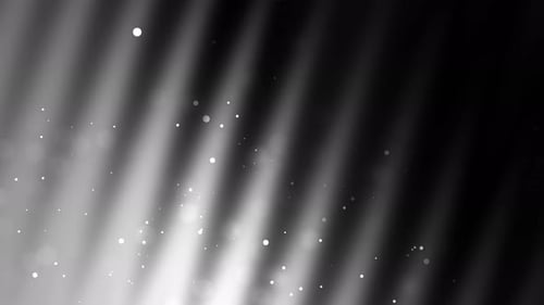 Monochromatic Abstract Light Rays and Glimmering Particles Background