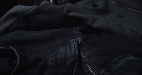 Close Up View Of Black Denim Pants. Men's Clothing. slider shot