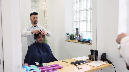Hair Clinic Technician Examining Patient's Scalp in Slow Motion