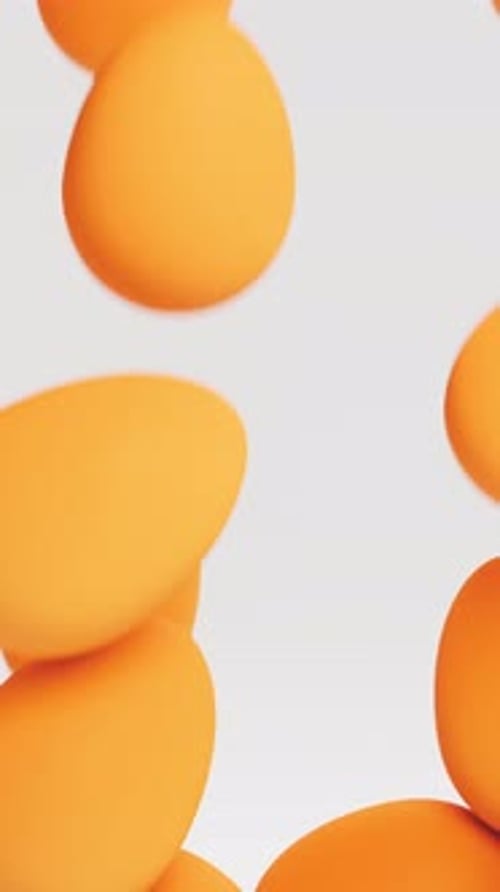Orange Easter Eggs Fall Down and Fill Up the Screen 3d Render Animation Vertical Video