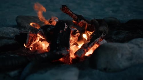Fire Burning Over The Sand On A Morning