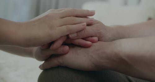 Hands Offering Comfort and Support