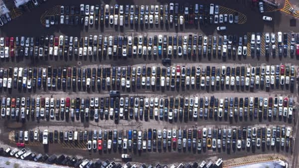 Overhead View of Parking Lot With Dense Rows of Cars and Vehicles ...