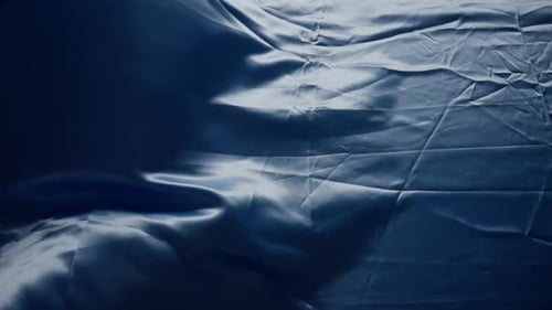 Flowing Blue Crumpled Fabric Texture Background