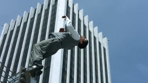 Business Man Does Back Flip,