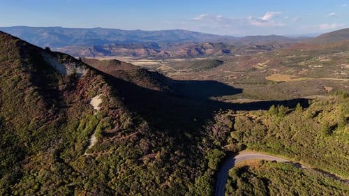 Aerial view of mountains and road, United States.