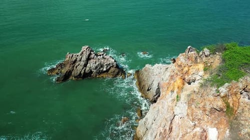 Sea Waves Breaking Over Rocks Mountains Vitality of Blue Energy and Clear Ocean Water Top View