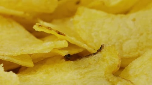 Potato chips rotating close up.