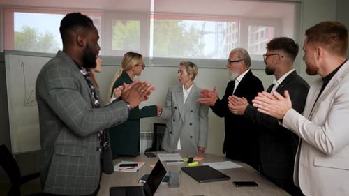 Business Professionals Conclude Deal in Office Meeting