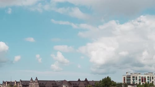 Billowing Clouds Time Lapse Over Cityscape
