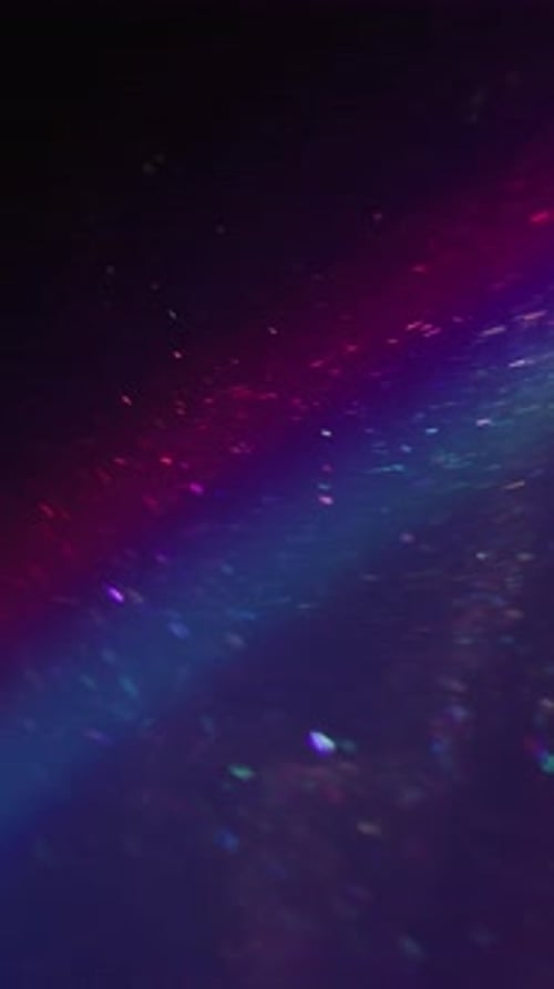 Colorful Shiny Sparkles Against a Dark Background