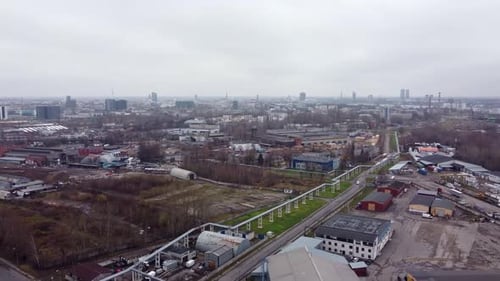 Aerial panoramic of Industrial port Town over foggy skyline, buildings, city of Riga, Latvia