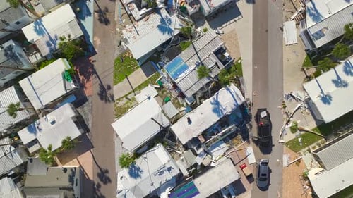 Severely Damaged Houses After Hurricane Ian in Florida Mobile Home Residential Area