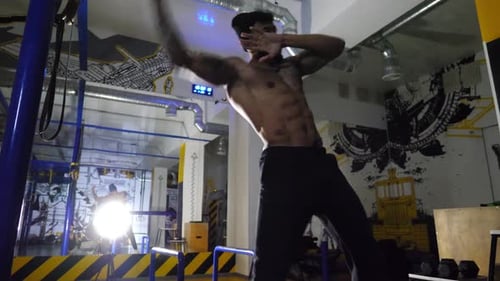 Muscular African Boxer Demonstrating Punches at Sport Club Young Afro American Sportsman Practicing