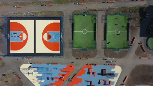 Aerial View on Contemporary Sport Grounds at Urban Park at Summer Day Youth Teenagers and Child