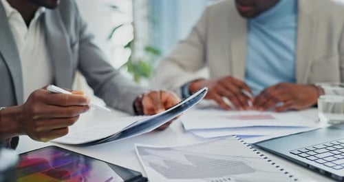 Discussion, documents and closeup of businessmen in the office talking about a financial data