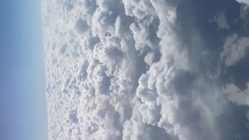 Aerial View of Clouds in a Blue Sky