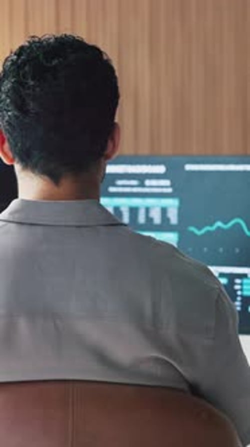 Man, trading and computer screen with graphs in office with back, review and stats for stock market