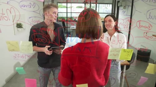 Team Brainstorming Ideas Together in Modern Office