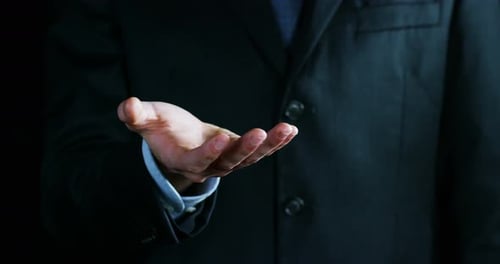 Open Hand in Business Suit