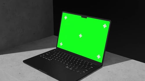 Modern Black Laptop with Green Screen Display Mockup