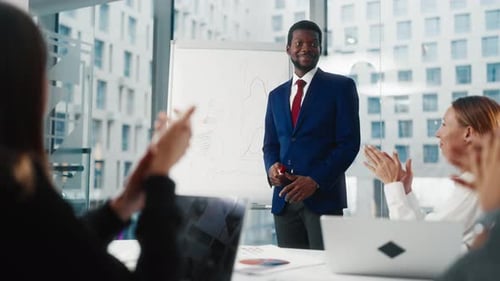 Brainstorm and Teamwork in Modern Office African American Man Performing Financial Analysis