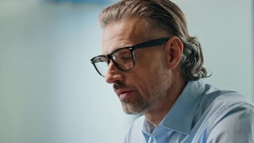 Portrait Stressful Man Working Office. Pensive Eyeglasses Director Feeling Nervous Sitting Workplace