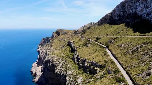 Scenic Road On Top Of Sheer Limestone Cliff Above the Turquoise Coastal Waters