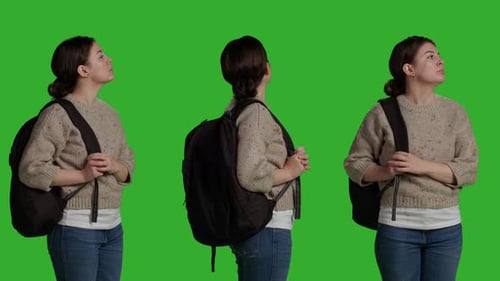 Close Up of Female Model Carrying Backpack Over Greenscreen Backdrop