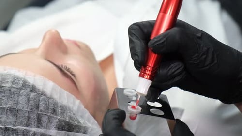Cosmetologist Prepares Permanent Lip Makeup in Clinic