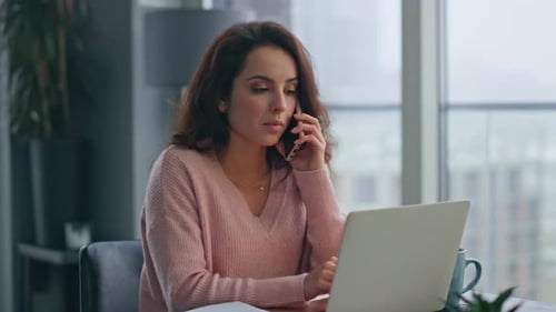 Busy Executive Speaking Mobile Phone in Home Office Closeup Serious Woman Call